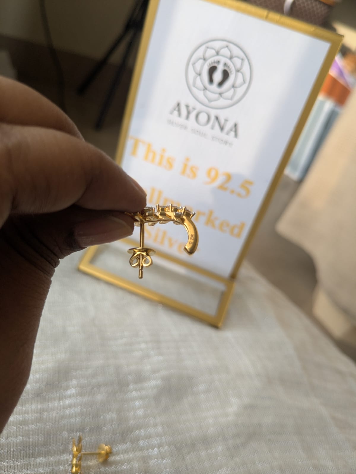 Mrinal gold plated stud earrings